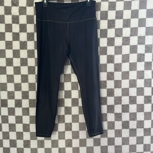 Athleta large black leggings with light pink stiching